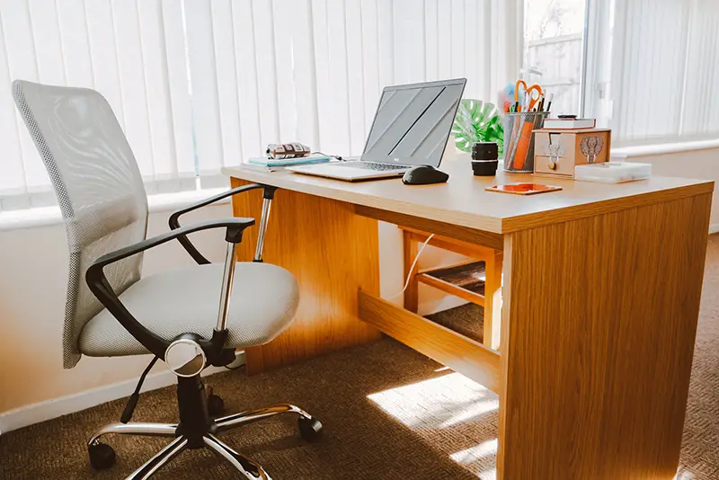 Office space with brown furniture desk