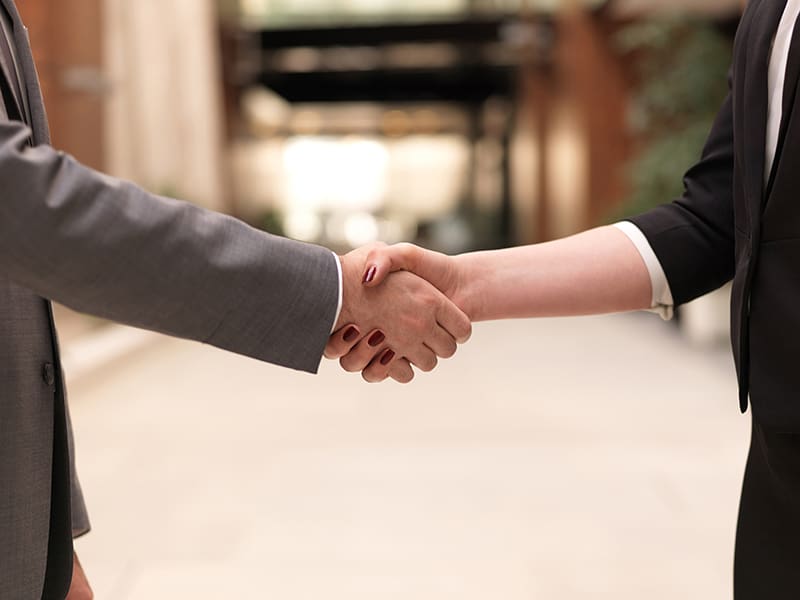 Partnership marketing - two people shaking hands