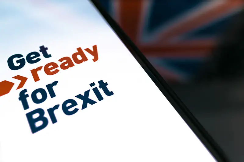 smartphone with text Get ready for Brexit on the background of the British flag
