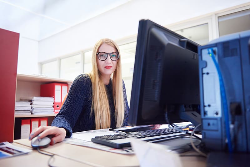 business woman working on computer at modern office