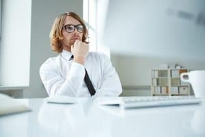 Portrait of an office worker with a pensive expression