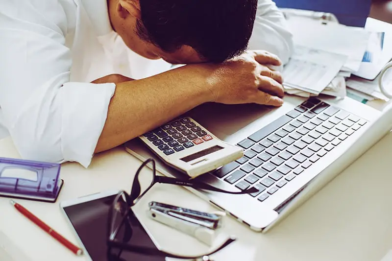 Accountant businessman working in office having a stress.