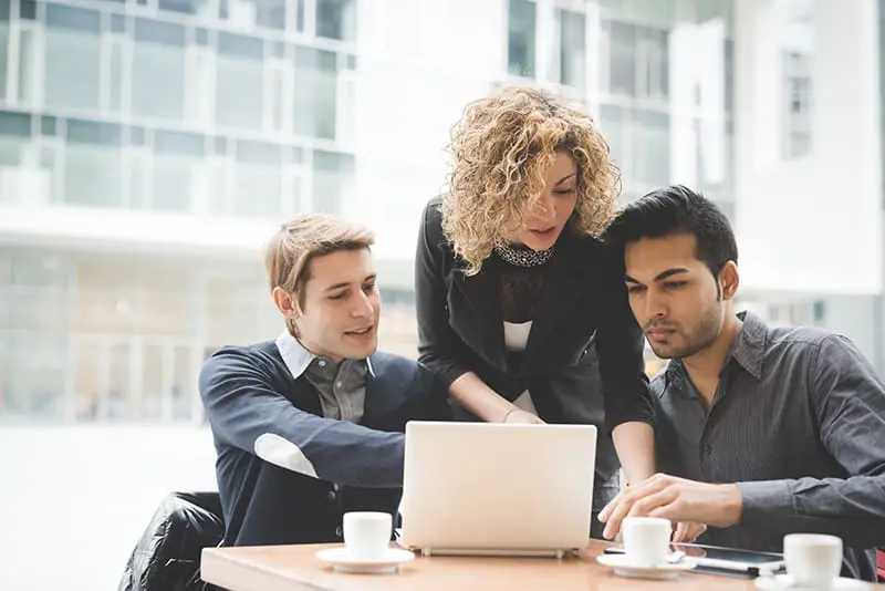 Multiracial business people working connected with technological devices like tablet and notebook - teamwork, business, working concept