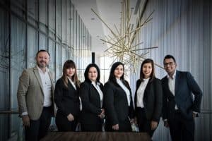 people standing in office - group photo