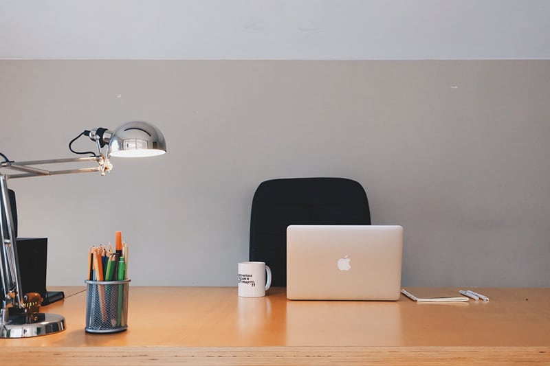 Virtual office - office chair, computer, mug and lamp on desk