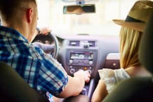 Young couple doing a car trip - 6 Car Loan Application Tips for Fast Approval Planning to purchase a car for your business? One of the most affordable ways to ge