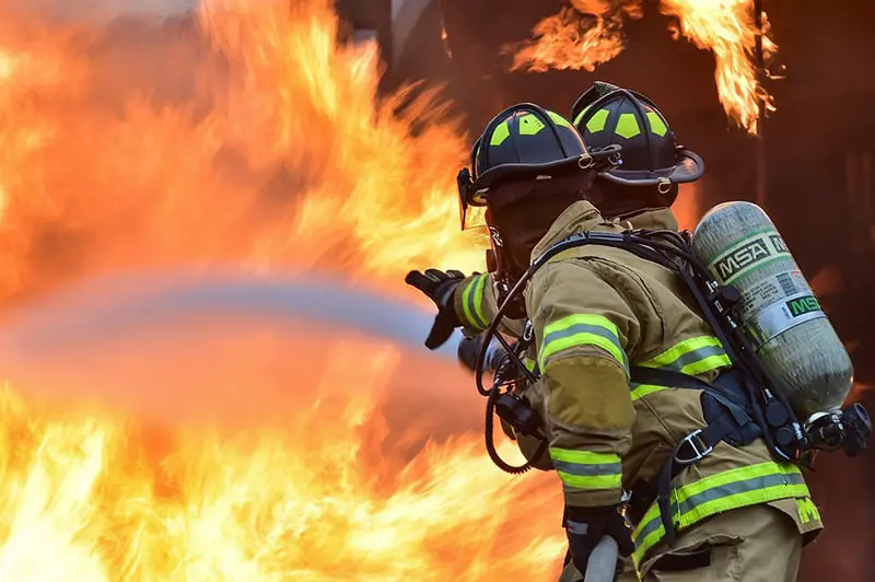 Firefighters training live fire