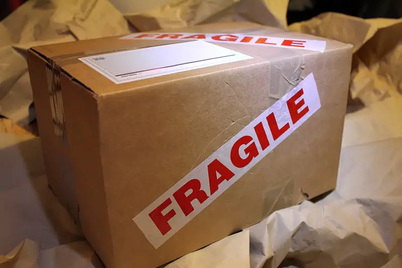 brown cardboard box parcel fragile tape