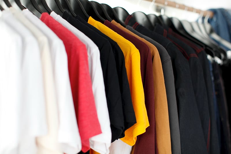 t-shirts on a clothes rail