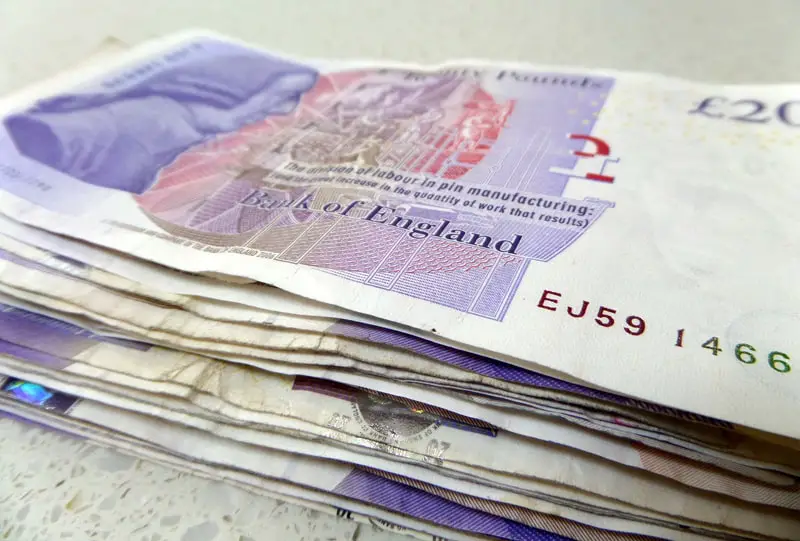 Stack of 20 pound notes sterling cash
