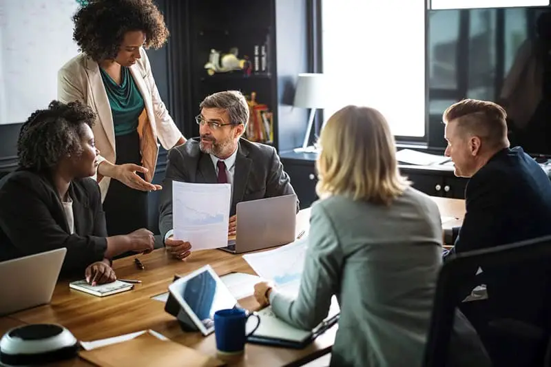 people gathering in a room - crisis management planning