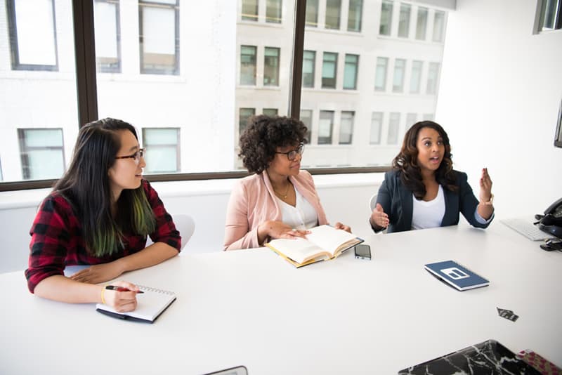 employees sitting around a conference table