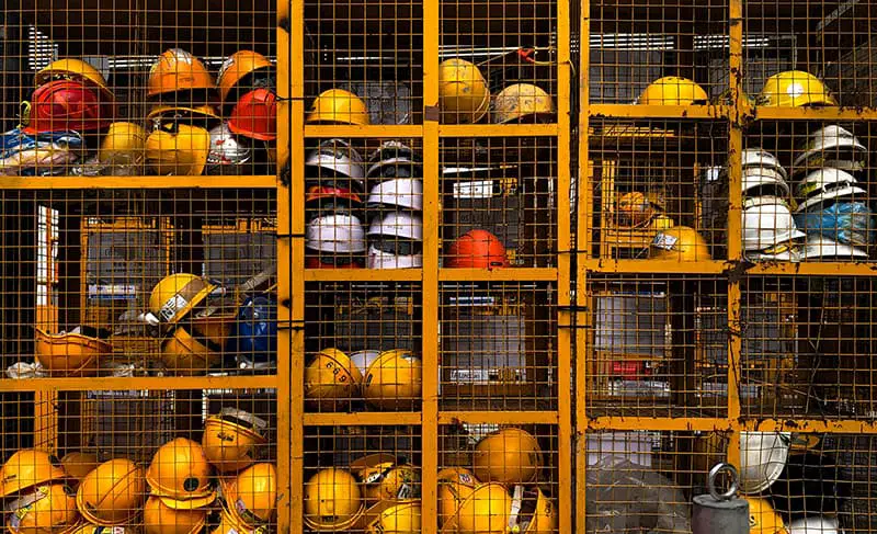 construction helmets – health and safety hard hats in storage cage