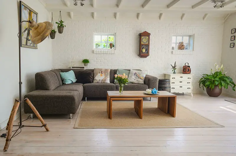 rental property - brown sofa and wooden table in room