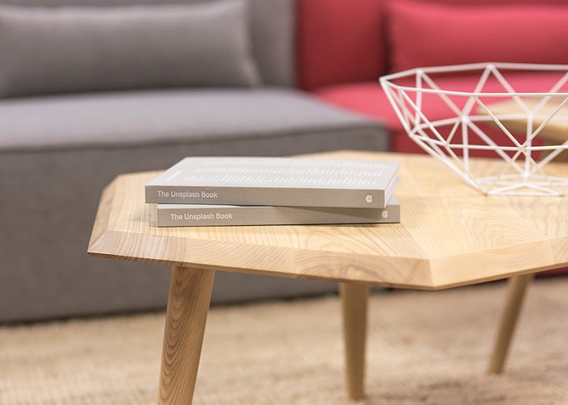 two grey books on coffee table