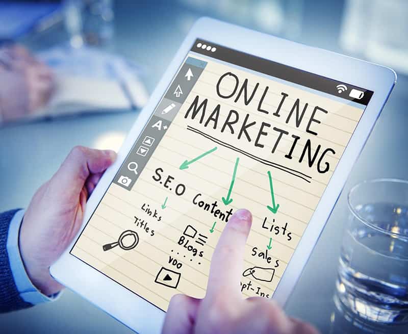 Tablet with online marketing elements - digital marketing
