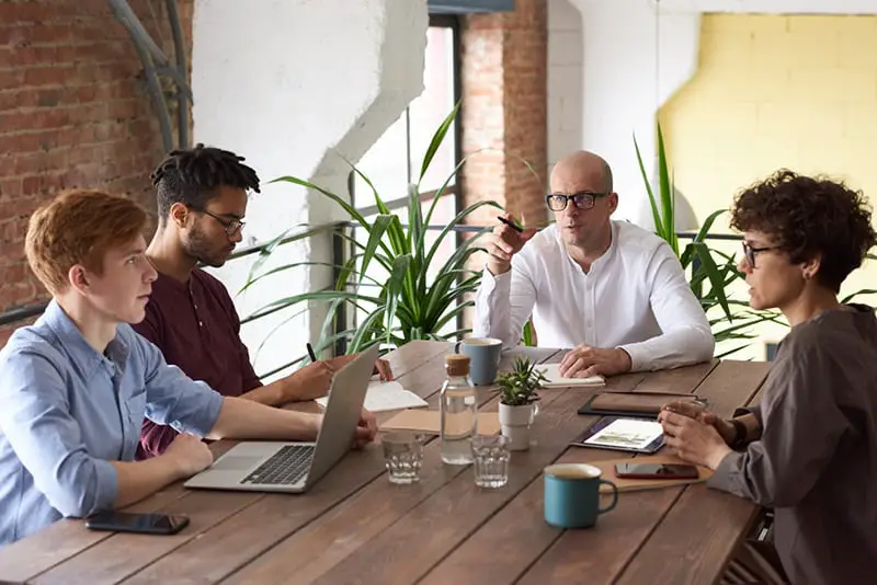 team have a meeting about succession planning