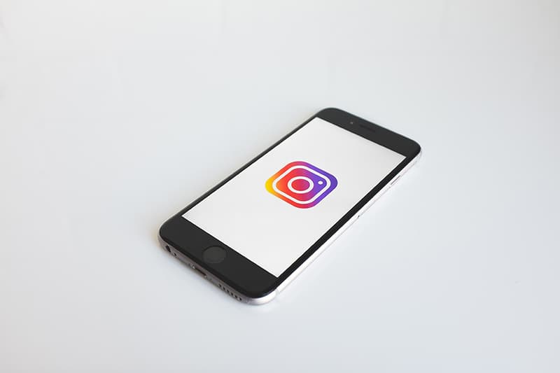 Instagram account logo on screen of iPhone