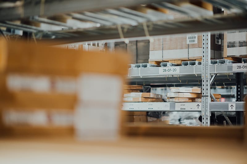 Shallow focus of parcels on steel rack - ready for delivery.