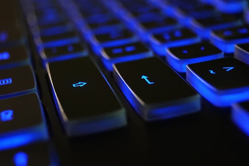 close up of blue and black computer keyboard