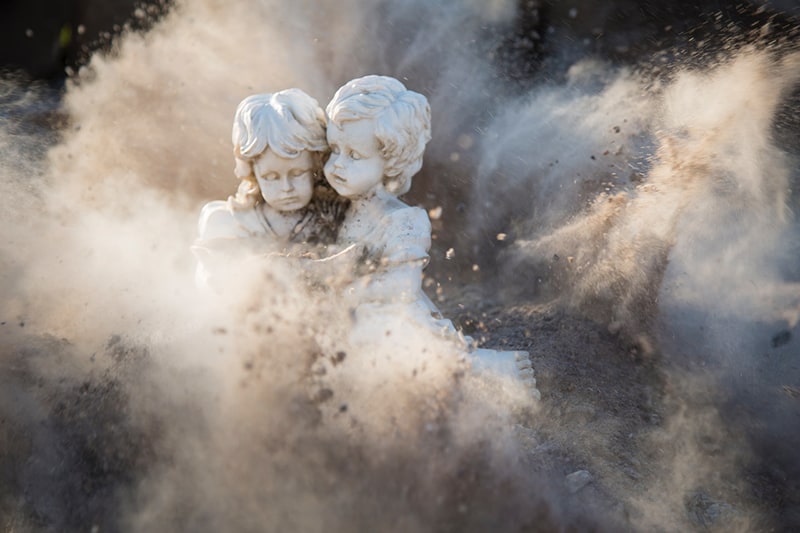 angelic statues covered in dust