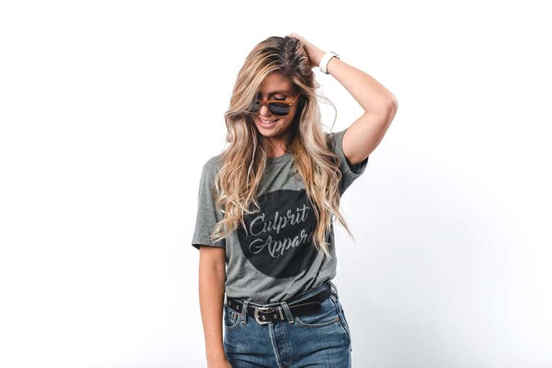 Woman Wearing Gray Custom Designed T-shirt Holding Head