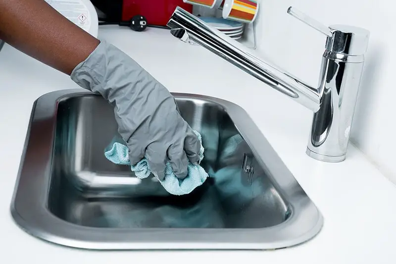 cleanliness, person cleaning kitchen sink, cleaning