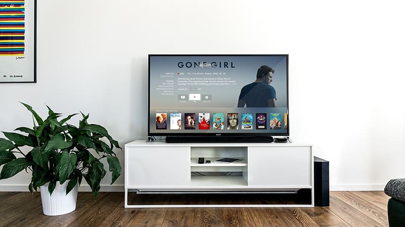 Flat screen monitor showing Netflix film menu – subscription-based entertainment.