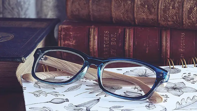 A transparent eye glasses in the table