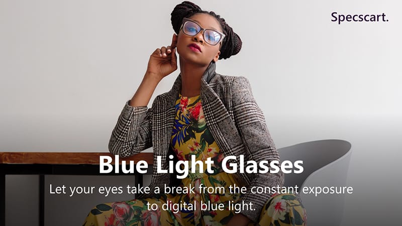 A woman wearing blue light glasses