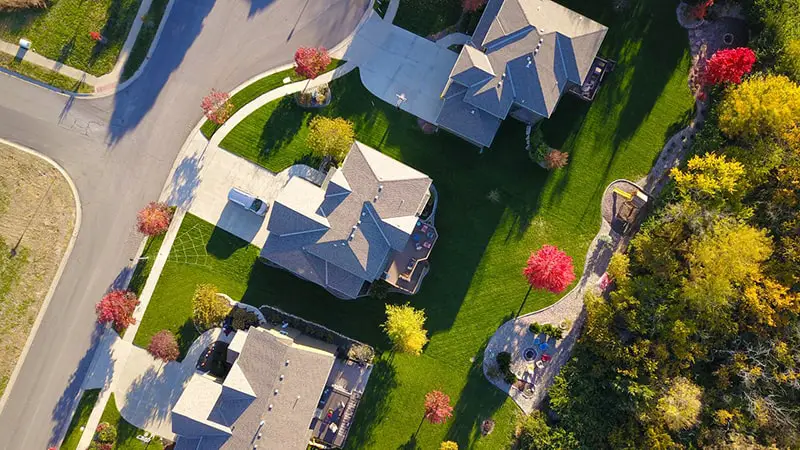 bird’s eye view of three houses