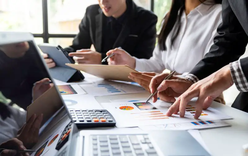 Professional executive Business colleague team working and analyzing with new project of accounting