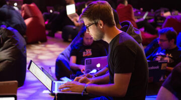 A group people working on each laptop