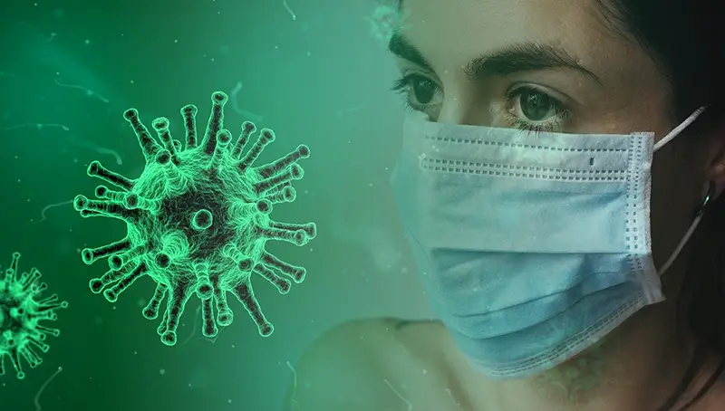 Covid-19 - coronavirus – virus – mask – person wearing mask in the workplace