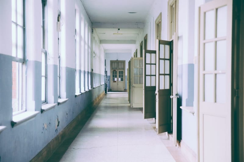 School corridor with lots of open doors 