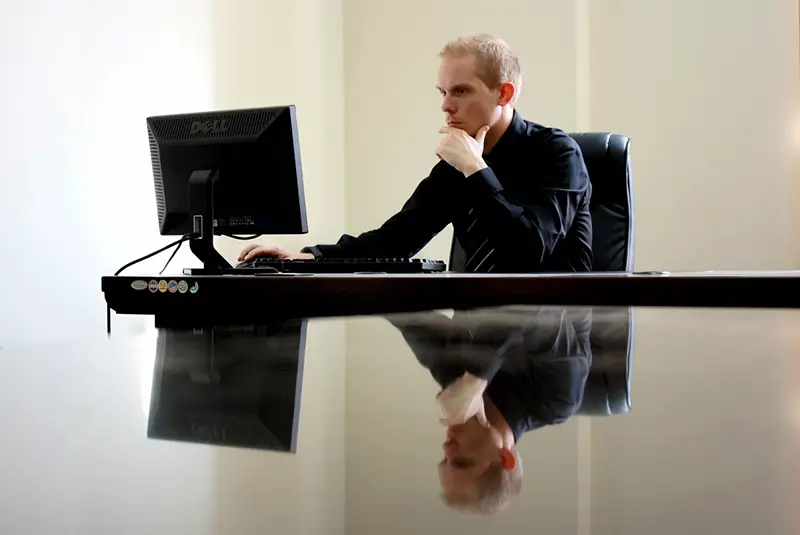 Entrepreneur sitting at desk working