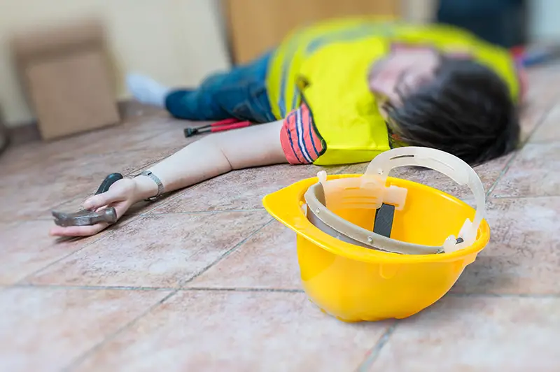 Injured man lying on the floor