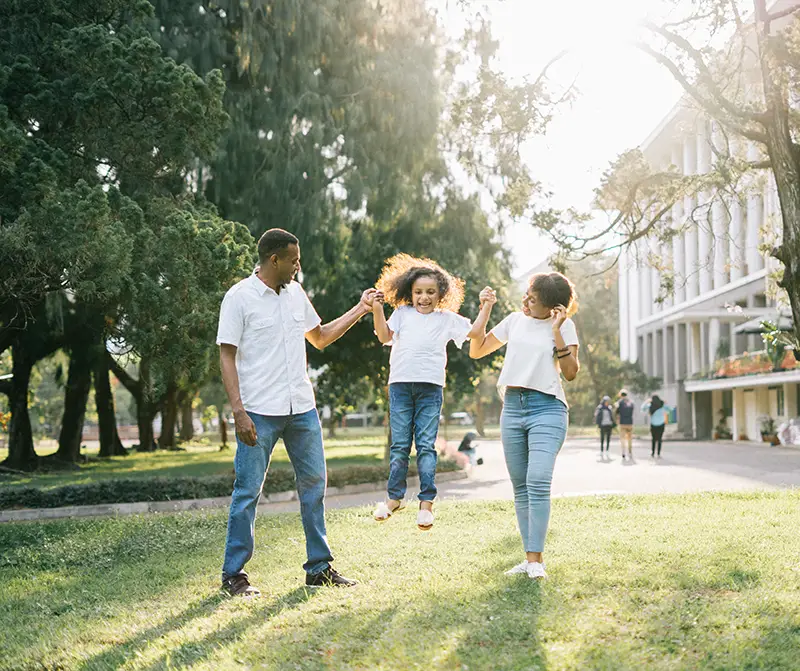 A family of three in the park