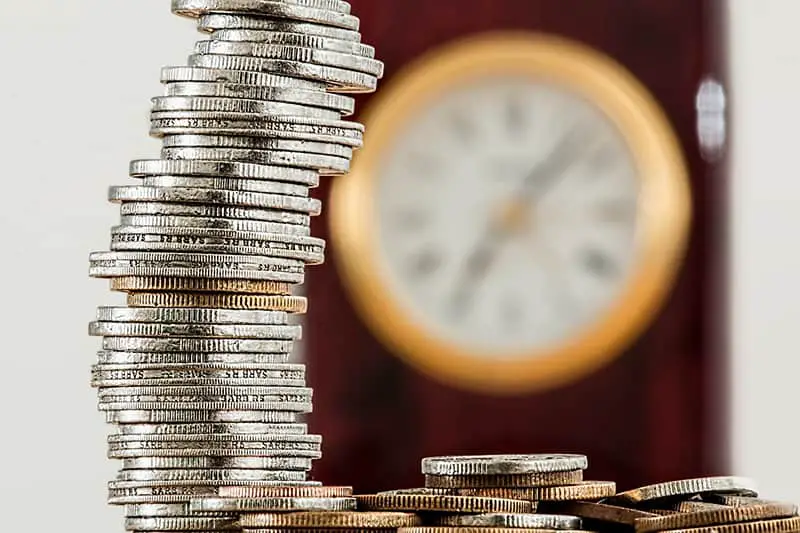 Stack of coins on table - savings for financial goals