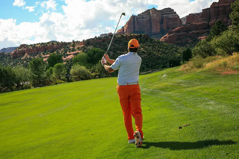 A man playing golf