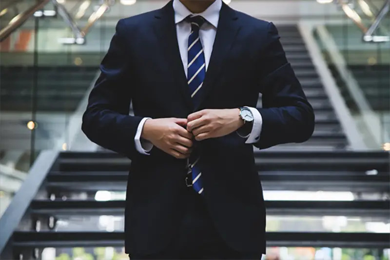 Man wearing smart business suit, short and tie ready for job interview