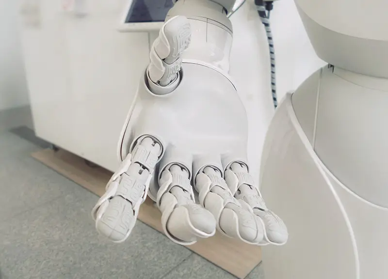 Closeup photo of white robot arm