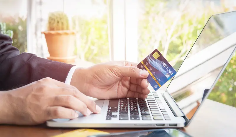 Businessman holding credit cad