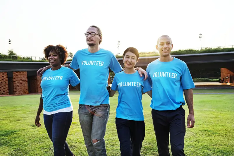 happy team of volunteers