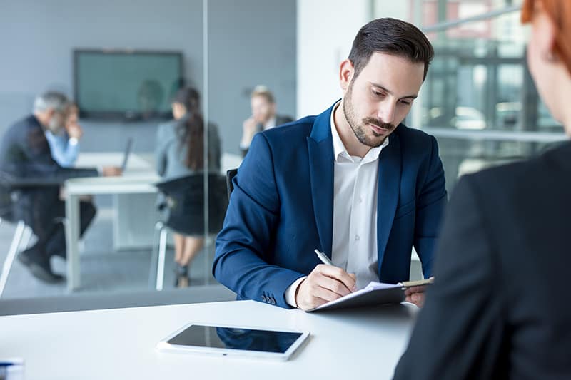 A man recruiter conducting an interview