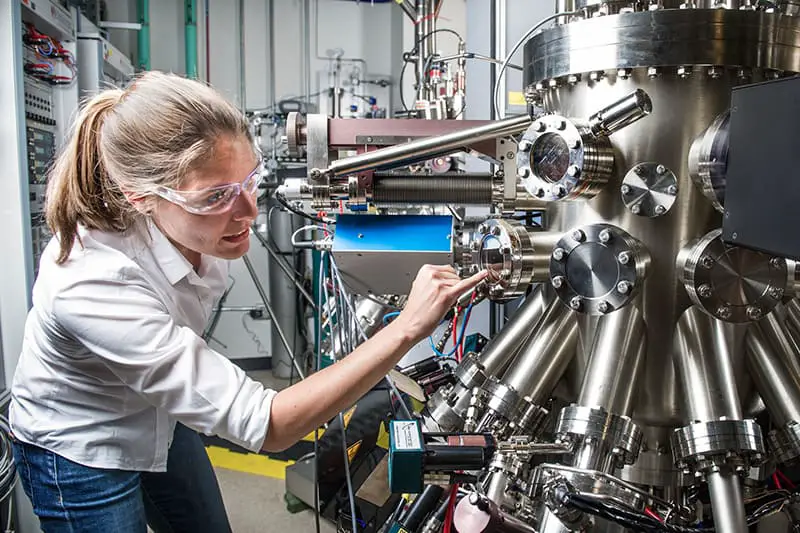 scientist working in lab with machinery coated in non stick coating