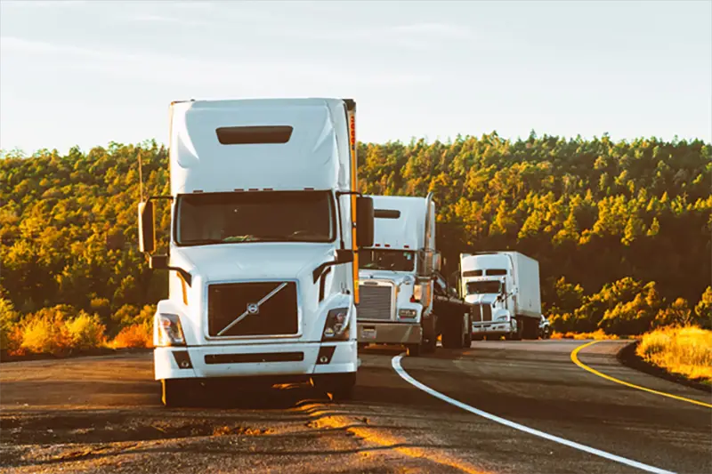 White delivery trucks