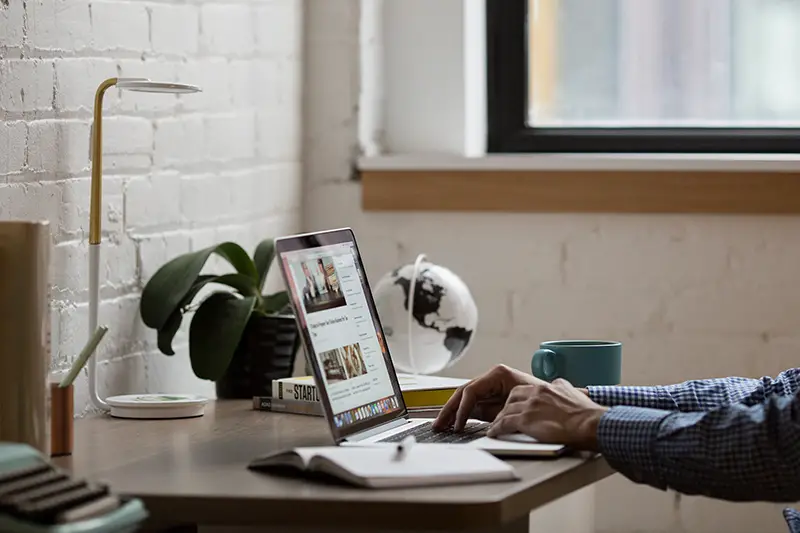 business man at work on his computer at his desk