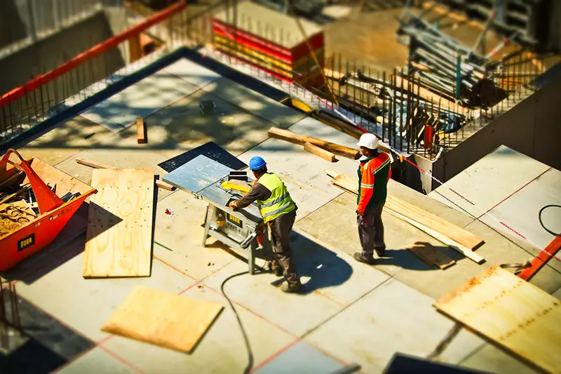 Two man on construction site during daytime