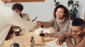 Woman and man doing the handshake